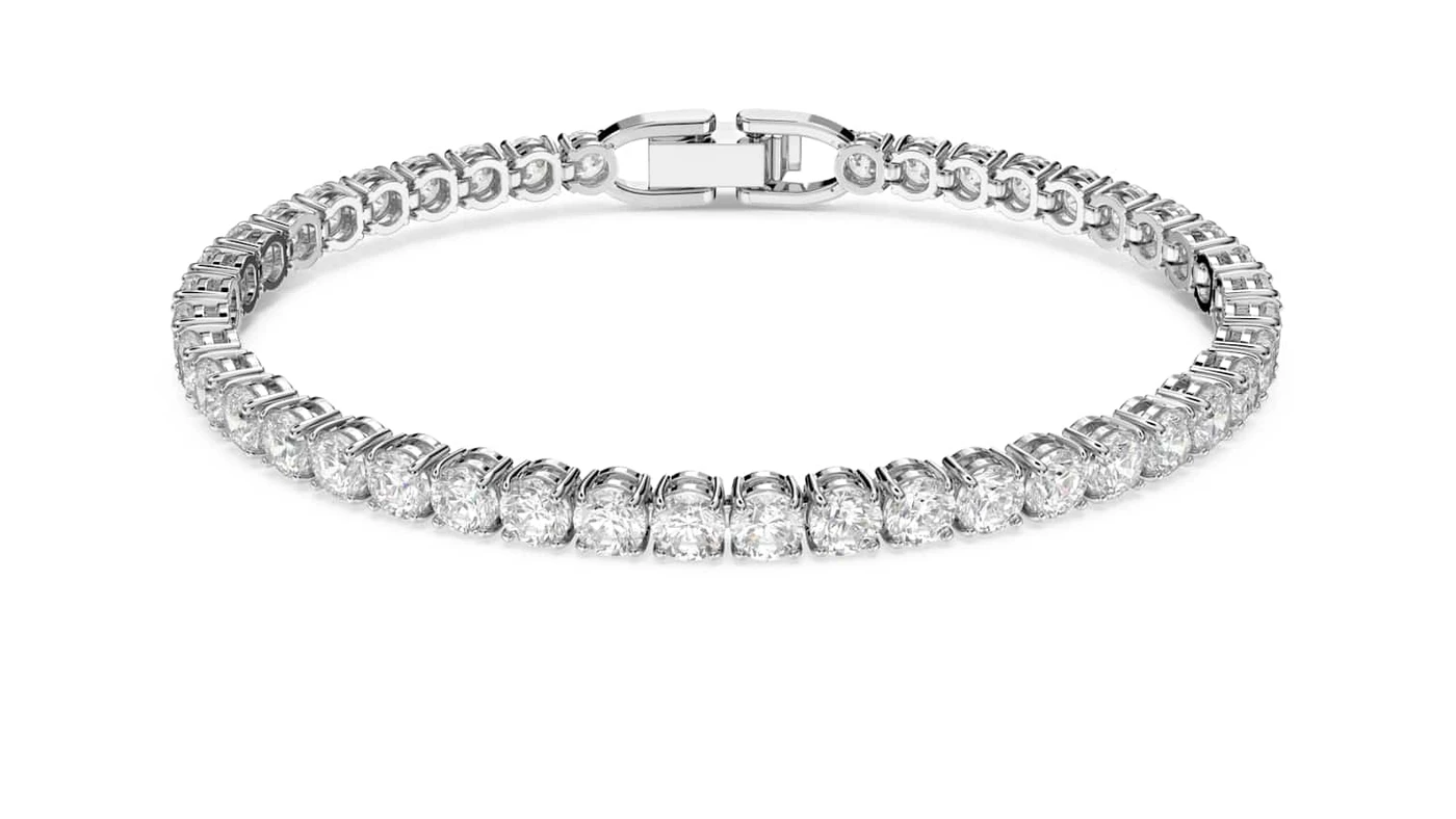 Bracelet Swarovski Tennis rhodié, ligne continue de cristaux ronds sertis sur une monture métallique souple