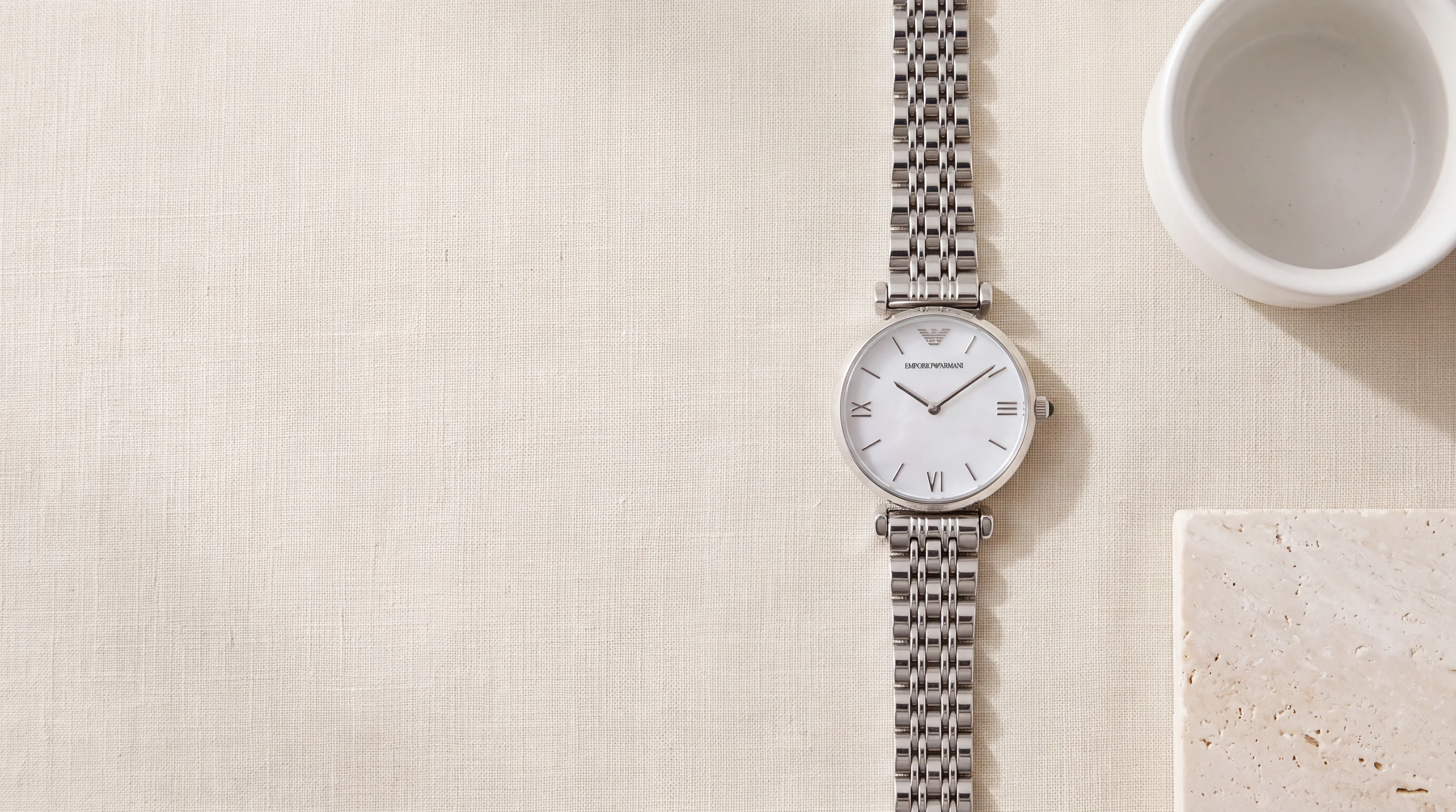 Emporio Armani Gianni T-Bar AR1682 women's steel watch with mother-of-pearl dial on ecru linen